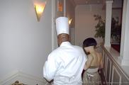 Chef Reginald Watkins leads Drue on behind the scenes tour of Charlie Trotter's